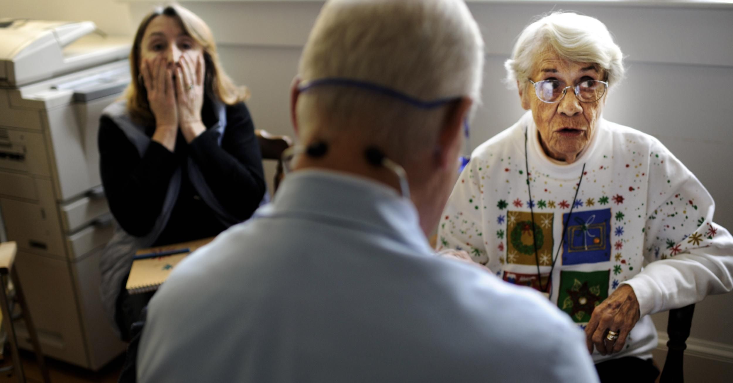 Doctor Emory Lewis gives a memory test to new Medicare patient, Helen Kinne, 88-years-old, while a concerned daughter, Deborah Kinne, looks on, at the family clinic in Reedville, Virginia, Monday, December 12, 2011. With approximately 65 percent of his patients insured by Medicare, Doctor Lewis, is closely watching the upcoming DocFix vote in Congress. (Photo by Melina Mara/The Washington Post via Getty Images)
