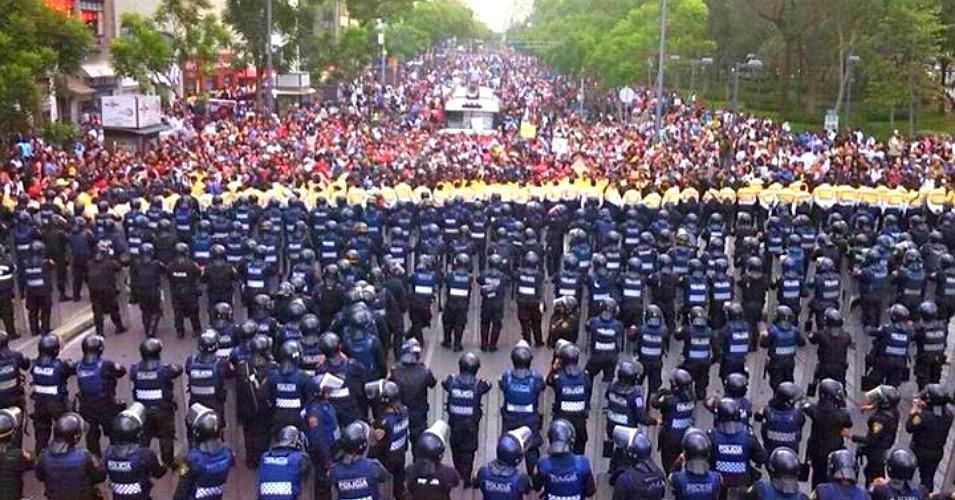 Four thousand police were reportedly deployed to counter the massive anti-government protest in Mexico City on Sunday. (Photo via @MexicAnarchist)