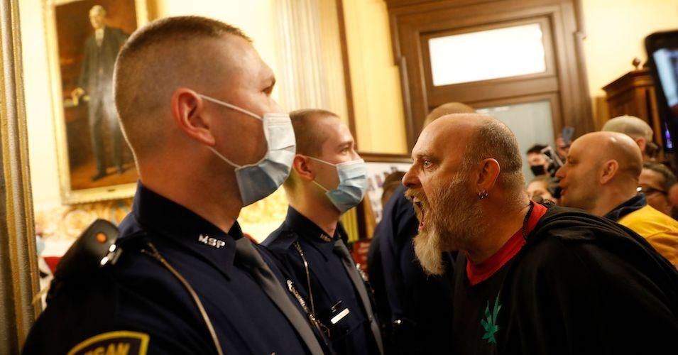 Protestors at the American Patriot Rally organized by Michigan United for Liberty protest for the reopening of businesses on April 30, 2020.