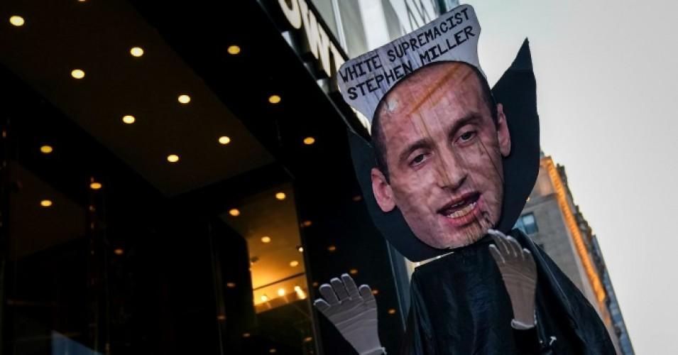 A man holds an effigy of White House policy advisor Stephen Miller as he rallies with protestors against U.S. President Donald Trump in front of Trump Tower on the night of his State of the Union address, February 5, 2019 in New York City. 
