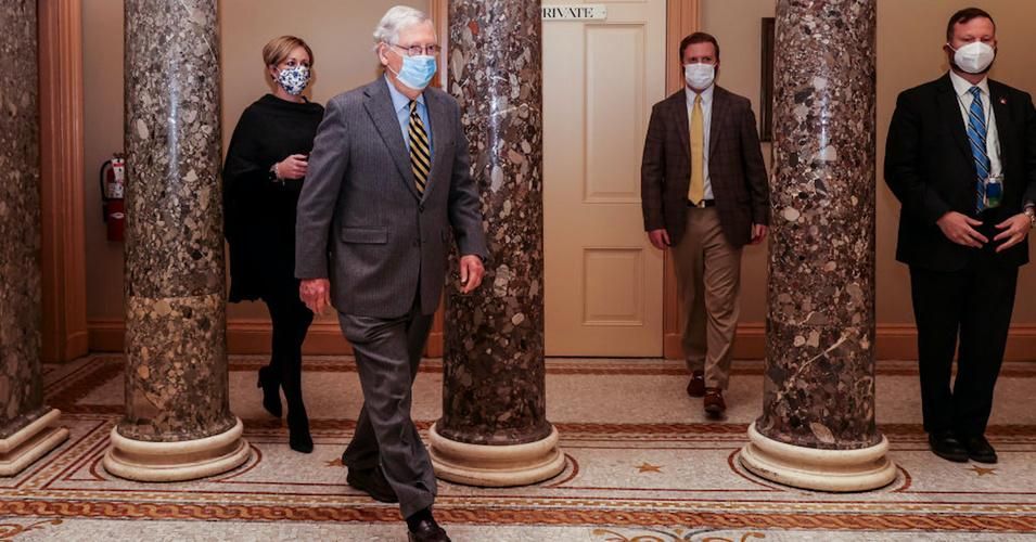 U.S. Senate Majority Leader Mitch McConnell (R-Ky.) heads to the Senate floor of the Capitol building on December 30, 2020 in Washington, DC. McConnell said today the Senate would “begin a process” to consider bigger Covid-19 relief, from the recently passed $600 per person to $2,000. (Photo: Tasos Katopidis/Getty Images)