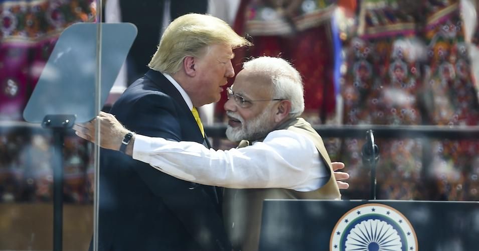 U.S. President Donald Trump shakes hands with India's Prime Minister Narendra Modi during 'Namaste Trump' rally at Sardar Patel Stadium in Motera, on the outskirts of Ahmedabad, on February 24, 2020. 