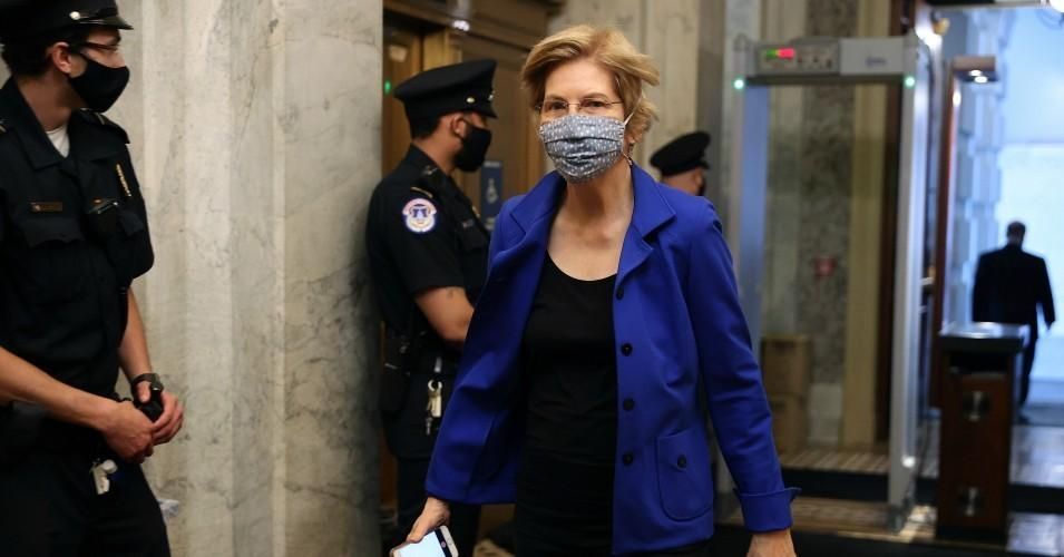 Wearing a face mask to reduce the chance of transmission of the coronavirus, Sen. Elizabeth Warren (D-Mass.) arrives at the U.S. Capitol for a vote May 18, 2020 in Washington, D.C. (Photo: Chip Somodevilla/Getty Images)
