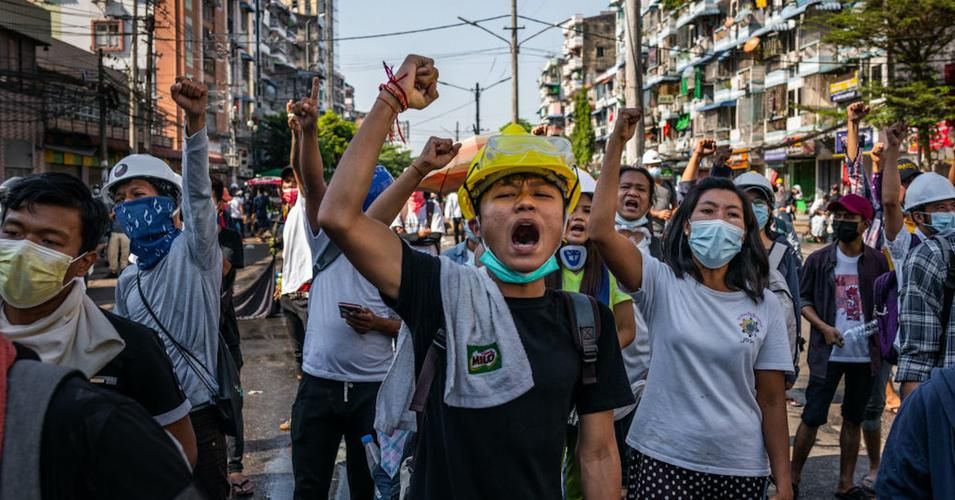 Anti-coup protesters shout slogans on March 1, 2021 in Yangon, Myanmar. Myanmar's military government has intensified a crackdown on protesters in recent days, using tear gas and live ammunition, charging at and arresting protesters and journalists. At least 18 people have been killed so far, according to monitoring organizations. (Photo: Hkun Lat/Getty Images)