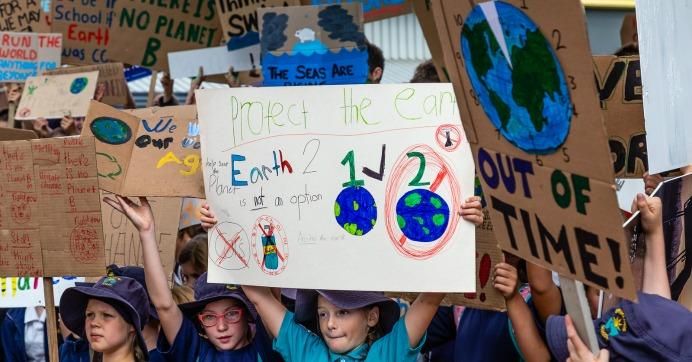 Young climate campaigners march in Blenheim, New Zealand on March 15, 2019. 