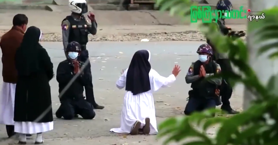 "I knelt down… begging them not to shoot and torture the children, but to shoot me and kill me instead," Sister Ann Rose Nu Tawng said of her attempt to dissuade police officers in Myitkyina, Myanmar from shooting people at a pro-democracy demonstration on March 8, 2021. (Photo: Twitter screengrab via Reuters)