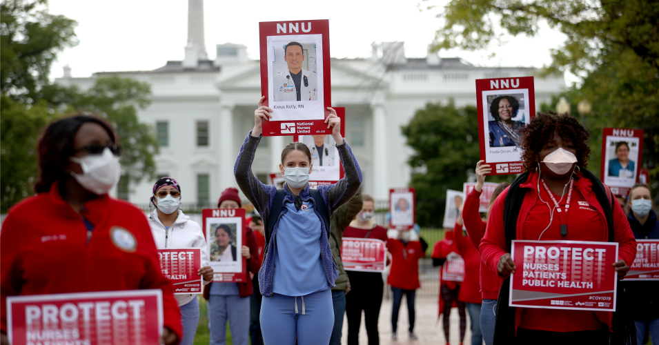 Members of National Nurses United, the largest nurses union in the United States, protest in front of the White House April 21, 2020 in Washington, D.C.