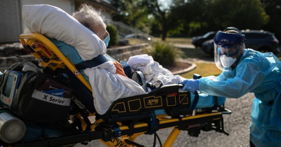 A medic loads a sick nursing home resident with Covid-19 symptoms into an ambulance on August 5, 2020 in Austin, Texas. (Photo: John Moore/Getty Images)
