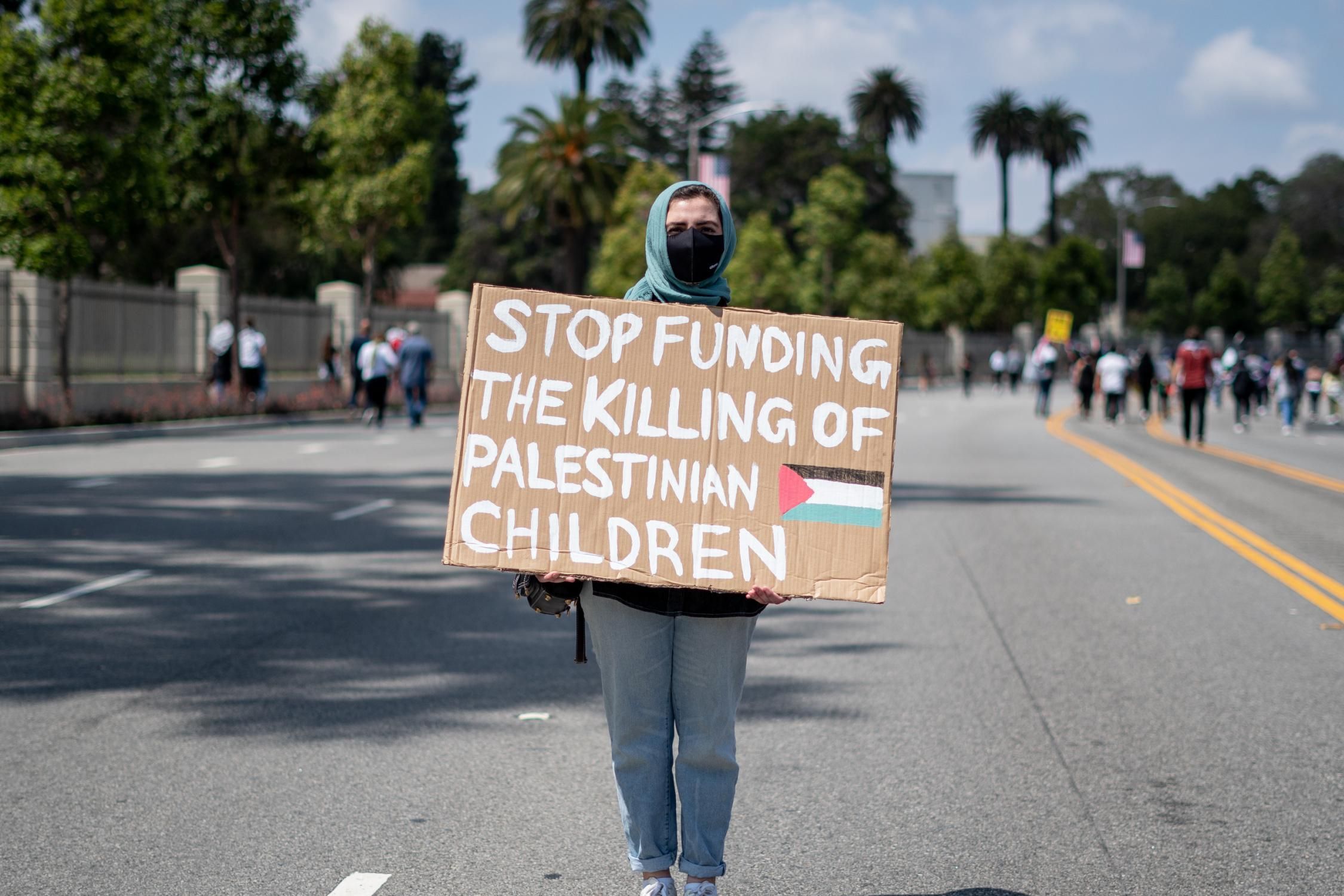 People attend a protest against Israel's assault on Gaza in Los Angeles, California on Saturday, May 15, 2021.