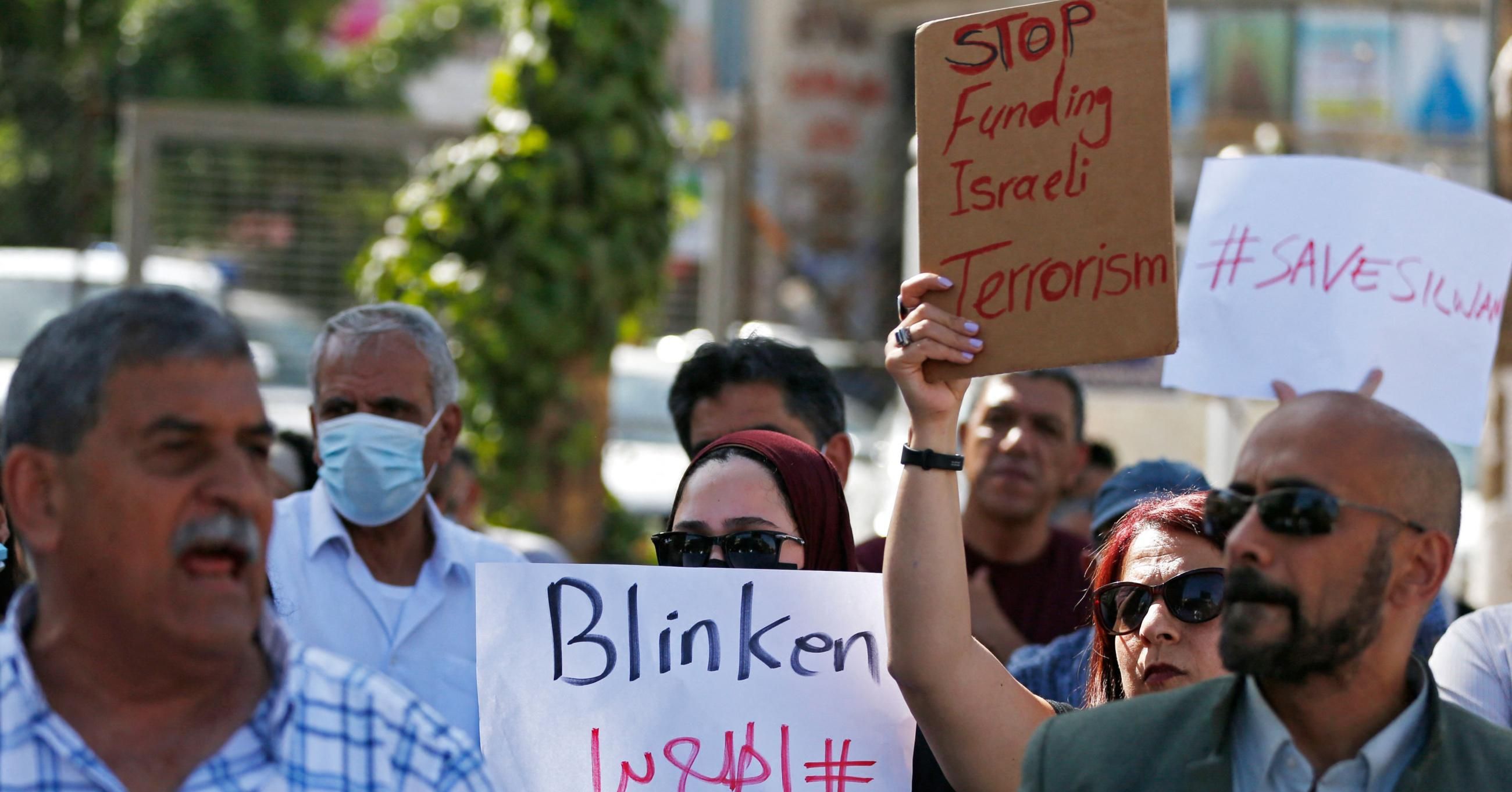 Palestinians protest U.S. Secretary of State Antony Blinken to the occupied West Bank