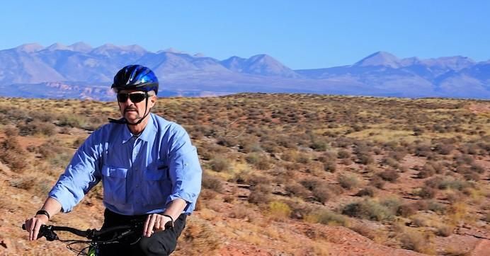 BLM Deputy Director for Policy and Programs William Perry Pendley rides a bike in Moab, Utah