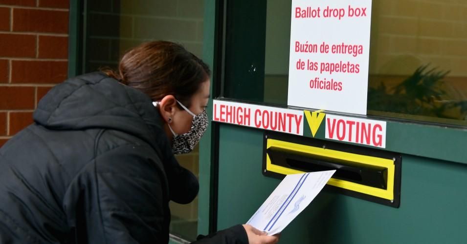 A voter arrives to drop off he ballot during early voting in Allentown, Pennsylvania on October 29, 2020. (Photo: Angela Weiss/AFP via Getty Images)