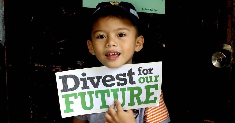 A child takes part in a Global Divestment Mobilisation (GDM) action in Davao, Philippines. 