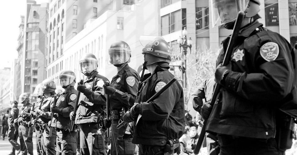 Presidential task force says that local law enforcement agencies must "acknowledge the role of policing in past and present injustice and discrimination and how it is a hurdle to the promotion of community trust." (Photo: Thomas Hawk/cc/flickr)