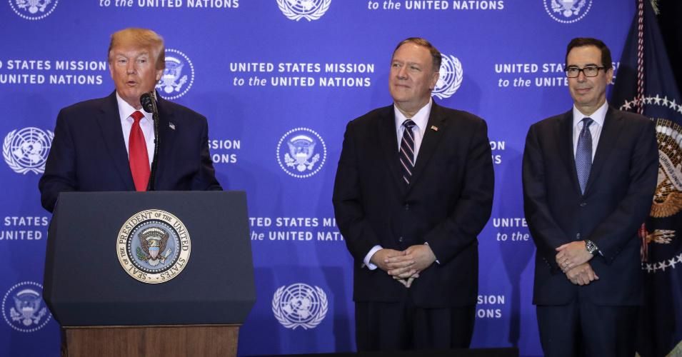 U.S. President Donald Trump speaks as U.S. Secretary of State Mike Pompeo and Treasury Secretary Steven Mnuchin listen during a press conference on the sidelines of the United Nations General Assembly on September 25, 2019 in New York City. Speaker of the House Nancy Pelosi announced yesterday that the House will launch a formal impeachment inquiry into President Trump. (Photo: Drew Angerer/Getty Images)