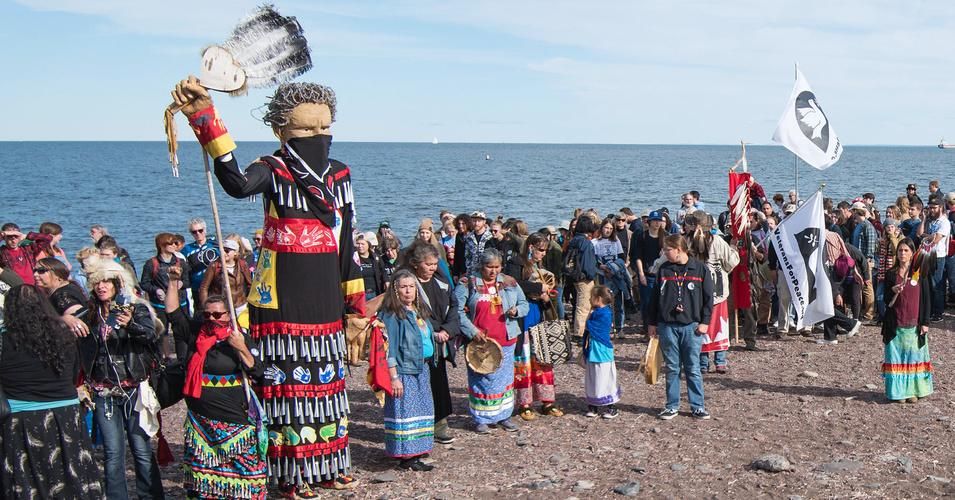 Native American and allied people gather on the shore of Lake Superior on September 27, 2019 to protest the Enbridge Line 3 tar sands pipeline