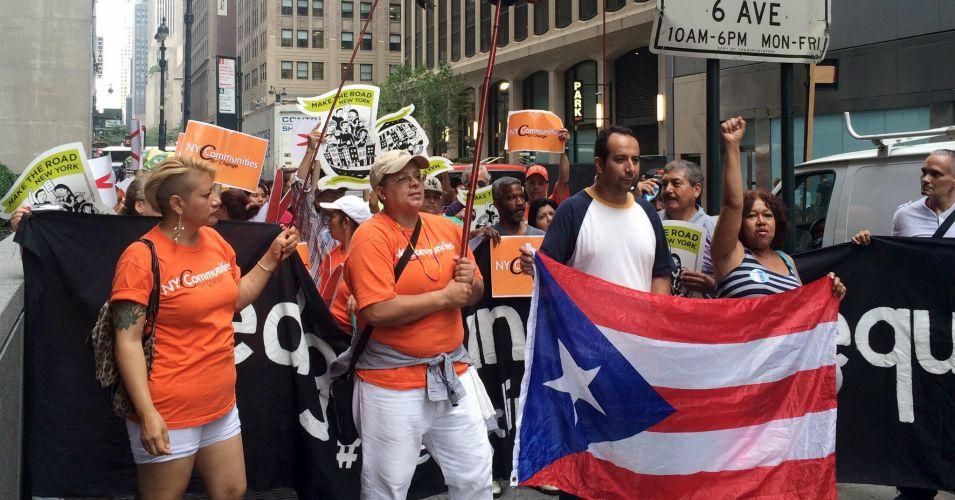 Protesters march to the New York offices of BlueMountain Capital Management, which owns debt from the Puerto Rico Electric Power Authority. July 30, 2015. (Photo: Reuters)