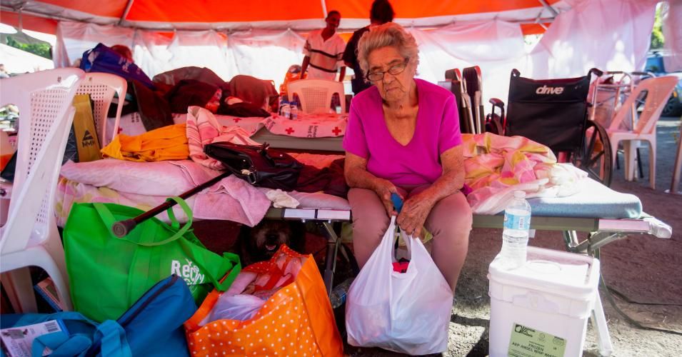 Oliviera Feliciano rests at the refugee camp located at the Mariano Rodríguez Coliseum on January 11, 2020 in Guanica, Puerto Rico. Saturday morning's quake was the most powerful aftershock following Tuesday's 6.4 earthquake that damaged her home. (Photo: Jose Jimenez/Getty Images)