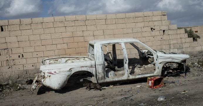 A destroyed car is seen in the western neighborhood of Jazrah on the outskirts of Raqqa, Syria on October 30, 2017.