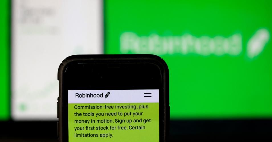 "We now need to know more about Robinhood's decision to block retail investors from purchasing stock while hedge funds are freely able to trade the stock as they see fit," Rep. Alexandria Ocasio-Cortez (D-N.Y.) said on Thursday, January 28, 2021. (Photo Illustration: Justin Sullivan/Getty Images)
