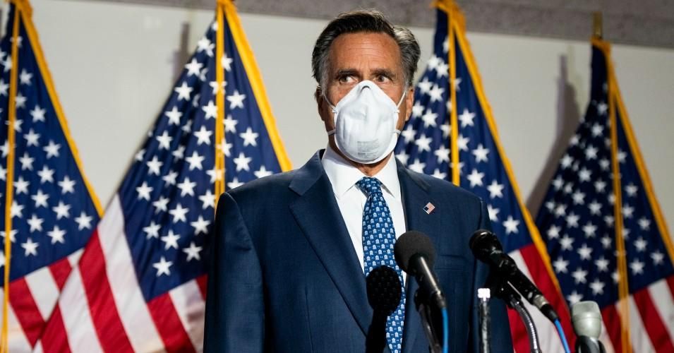 Sen. Mitt Romney (R-Utah) speaks to reporters as he arrives for the Senate Republicans' weekly lunch on Tuesday, June 9, 2020.