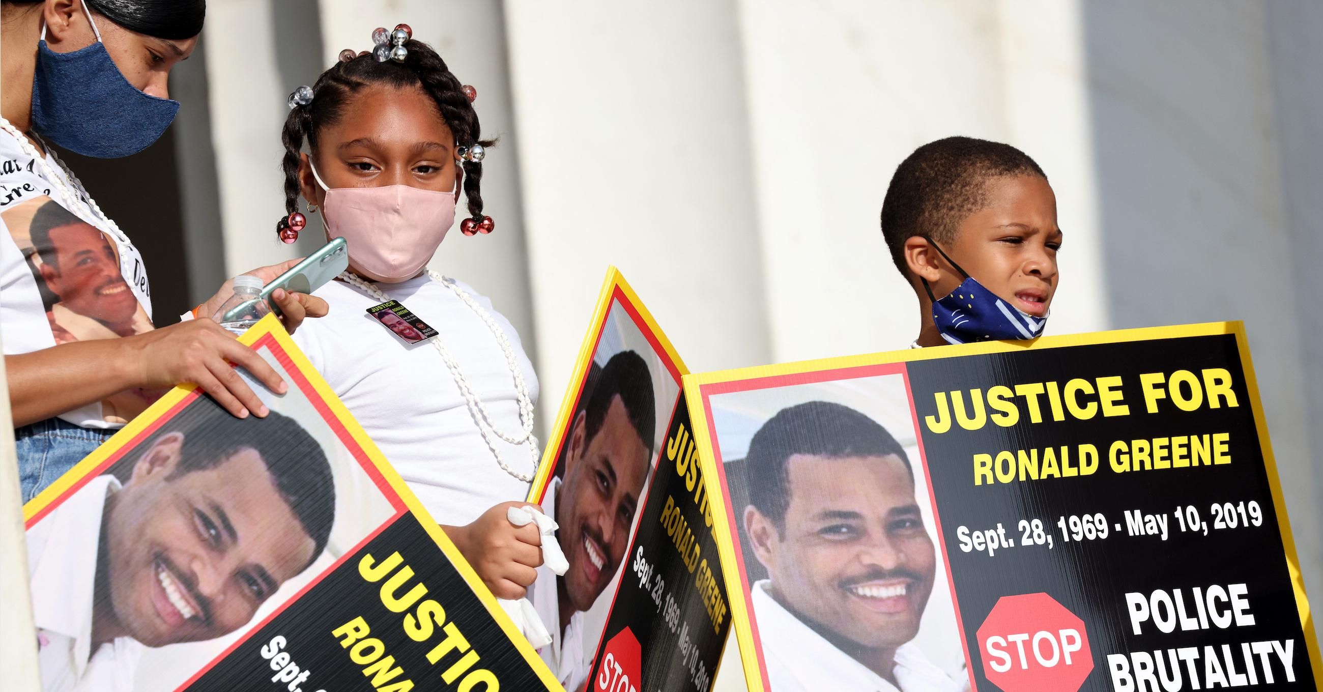 Relatives of Ronald Greene, an unarmed Black man who died following his brutal arrest by Louisiana State Police troopers in May 2019, demand justice during an August 28, 2020 demonstration at the Lincoln Memorial in Washington, D.C. (Photo: Michael M. Santiago/Getty Images) 