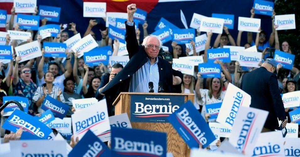 Sen. Bernie Sanders (I-Vt.), a 2020 Democratic presidential candidate, pumps his fist in the air toward supporters as he arrives to speak during a campaign rally at Civic Center Park on September 9, 2019 in Denver.