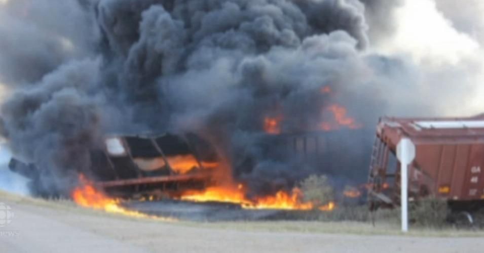 Black smoke billows from the derailed CN Rail train. Six of the cars carried hazardous and highly-flammable materials. (Screenshot via CBC)