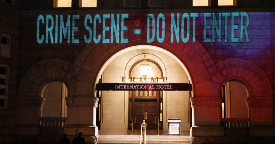Robin Bell, who has claimed credit for earlier projected protests at the Trump International Hotel in Washington, D.C., tweeted an image of the projection. (Photo: @bellvisuals/Twitter)