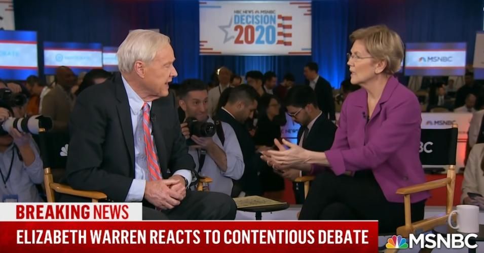 Chris Matthews interviews Sen. Elizabeth Warren following a recent Democratic presidential primary debate. On Tuesday, Matthews questioned Warren's position that former New York Mayor Michael Bloomberg is lying about reports that he sexually harassed and discriminated against his employees. 