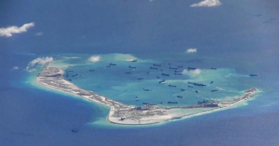 Chinese dredging vessels seen in the waters around Mischief Reef in the disputed Spratly Islands in the South China Sea in this video image taken by a P-8A Poseidon surveillance aircraft provided by the U.S. Navy, May 21, 2015. 