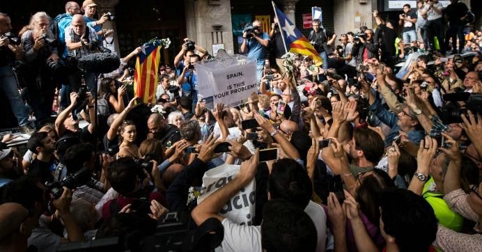 Spanish Civil Guard police have stormed several Catalan government ministries in an attempt to stop the region's independence referendum on October 1, which has been deemed illegal by the Spanish government in Madrid. (Photo: David Ramos/Getty Images)