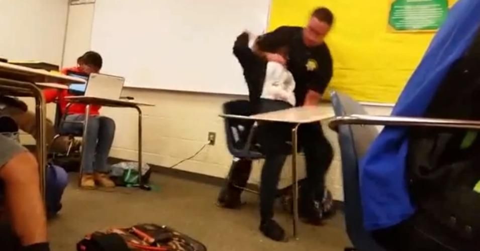 Classmates said they were "scared for their lives" as they watched Officer Ben Fields assault an unnamed female student at Spring Valley High in Colombia, South Carolina. (Screenshot via Reginald Seabrooks/Youtube)