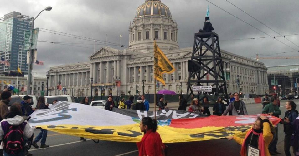 Indigenous, community, student, and worker groups stage direct action in downtown San Francisco demanding end to toxic drilling in California. (Photo courtesy of Laurel Sutherlin)