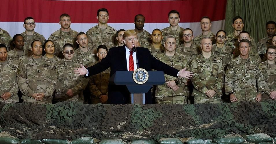 President Donald Trump speaks to U.S. troops during a surprise Thanksgiving day visit at Bagram Air Field in Afghanistan. 