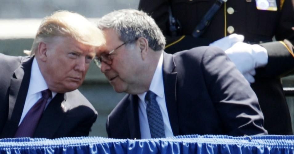 President Donald Trump listens to Attorney General William Barr during the 38th Annual National Peace Officers' Memorial Service at the west front of the Capitol May 15, 2019 in Washington, D.C.