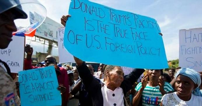 Demonstrators protested in front of the U.S. Embassy against President Donald Trump's recent disparaging comments about Haiti and African nations, in Tabarre, a district of Port-au-Prince, Haiti, Thursday, Jan. 18, 2018. On Monday night, January 22, demonstrators again marched on the embassy.