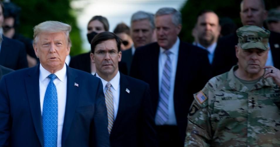 President Donald Trump walks with Attorney General William Barr, Secretary of Defense Mark Esper, Chairman of the Joint Chiefs of Staff Mark Milley, and others from the White House to visit St. John's Church on June 1, 2020, in Washington, D.C. (Photo: Brendan Smialowski/AFP via Getty Images)