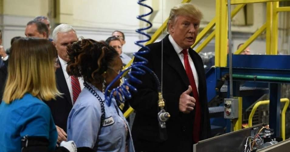 Then President-elect Donald Trump and Vice President-elect Gov. Mike Pence visit the Carrier air conditioning and heating company in Indianapolis on Dec. 1, 2016. (Photo: Timothy A. Clary/AFP/Getty Images)
