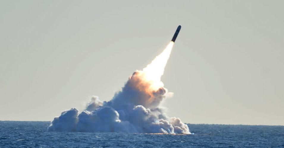 An unarmed Trident II D5 missile launches from the Ohio-class ballistic missile submarine USS Nebraska off the coast of California.