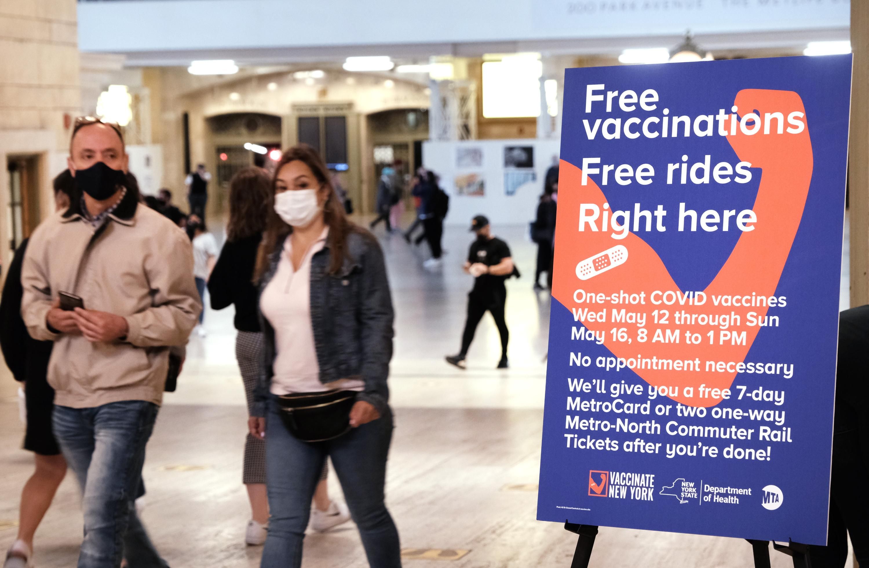People walk through Grand Central Terminal where a pop-up site for Covid-19 vaccinations opened on May 12, 2021 in New York City. (Photo: Spencer Platt via Getty Images)