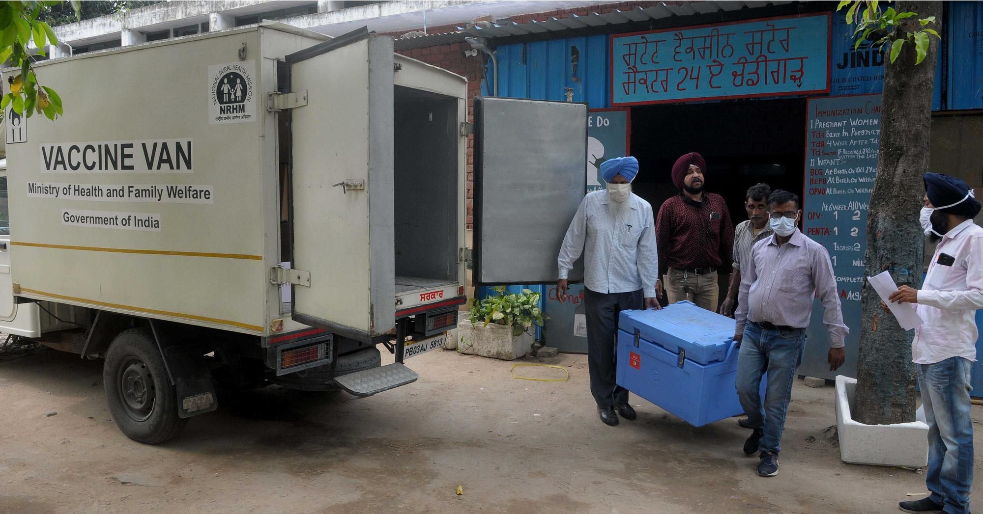 Workers handle Covid-19 vaccines at a distribution center in Chandigarh, India on May 4, 2021. (Photo: Ravi Kumar/Hindustan Times via Getty Images) 