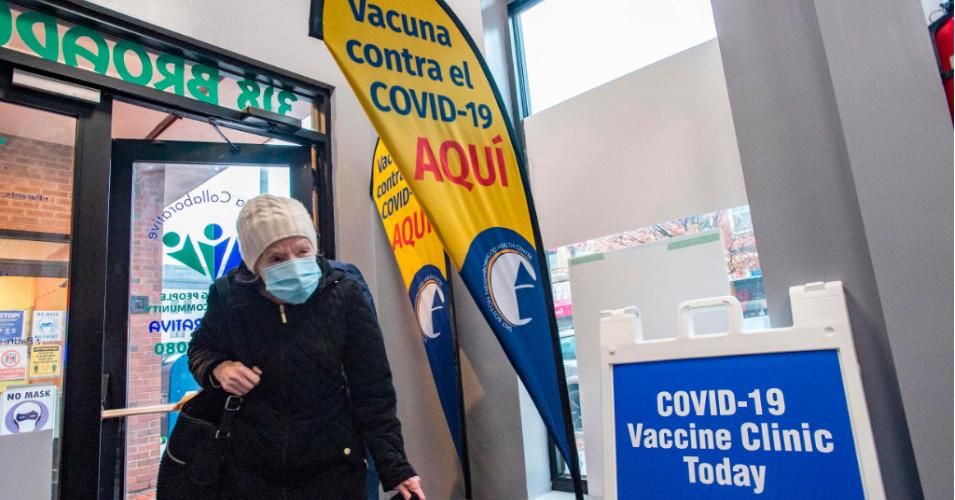 A woman enters La Colaborativa vaccine clinic in Chelsea, Massachusetts on February 16, 2021. (Photo: Joseph Prezioso/AFP via Getty Images)