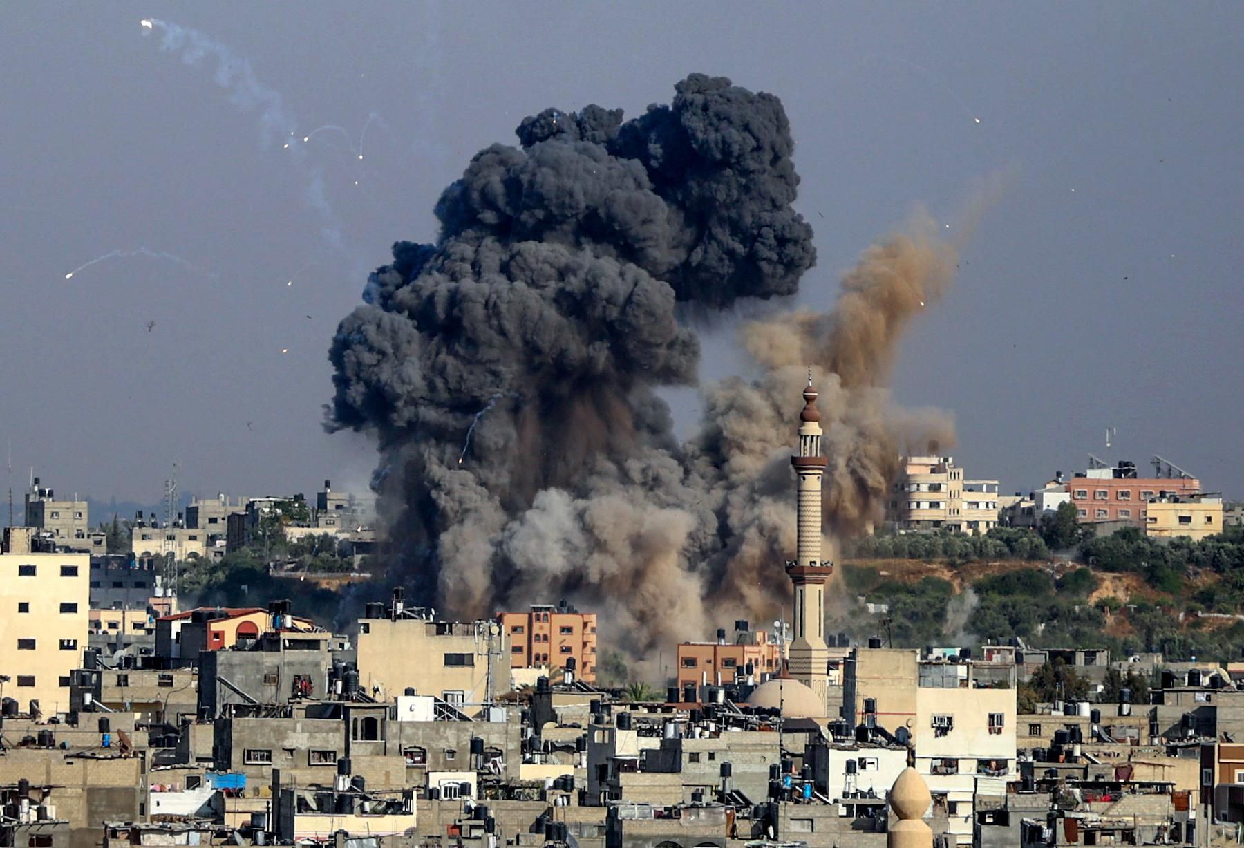 Smoke billows from Israeli airstrikes in Gaza City, controlled by the Palestinian Hamas movement, on May 11, 2021. 