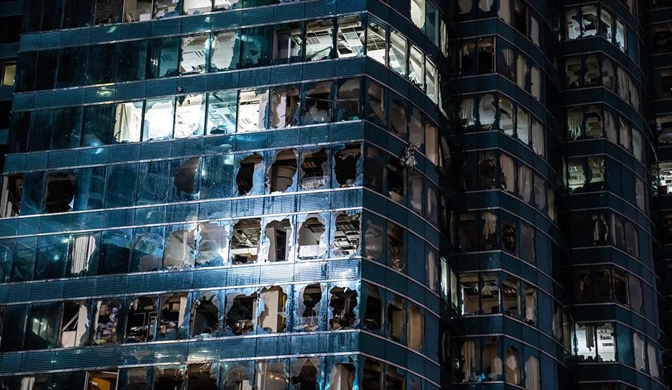 Windows of commercial building damaged by typhoon on September 16, 2018 in Hong Kong, Hong Kong. City officials raised the storm alert to T10, it's highest level, as Typhoon Mangkhut landed on Hong Kong.