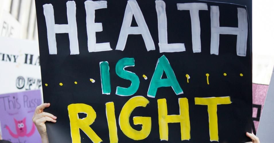 A sign reading "Health Is A Right" held up at the Women's March in Los Angeles on January 21, 2017.
