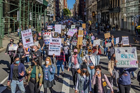 Participants in the latest Women's March took to the streets of New York City on Saturday, October 17, 2020 to denounce President Donald Trump, Judge Amy Coney Barrett, and the Republican Party's conservative agenda. (Photo: Erik McGregor/LightRocket via Getty Images)