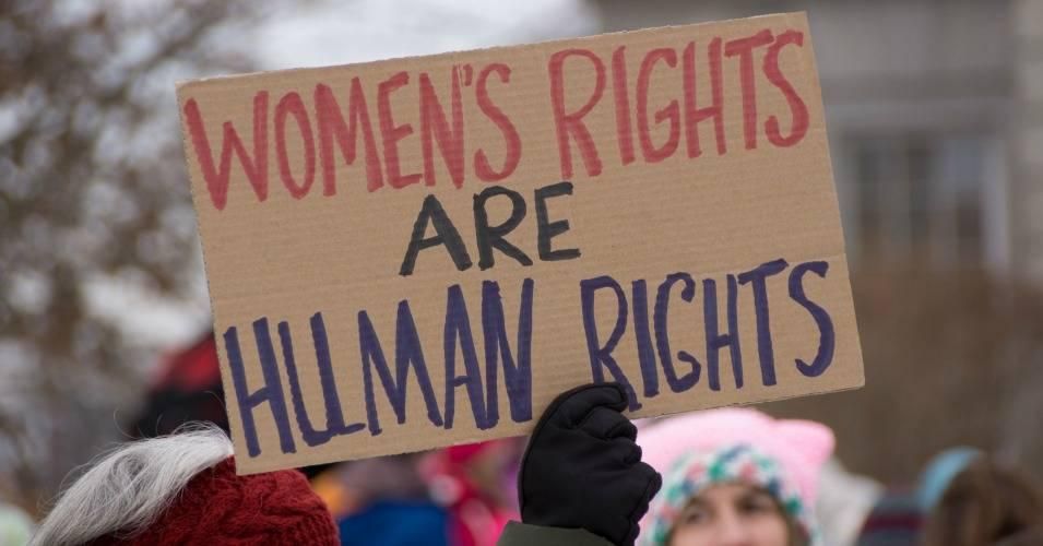 Sign reads: "Women's rights are human rights."