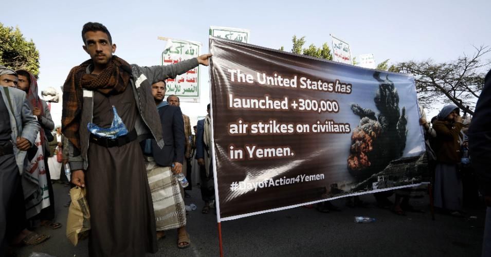 Houthi supporters hold a banner as they gather during a protest against the decision by the Trump administration to designate the Houthi group a foreign terrorist organization on January 25, 2021 in Sana'a, Yemen. (Photo: Mohammed Hamoud/Getty Images)