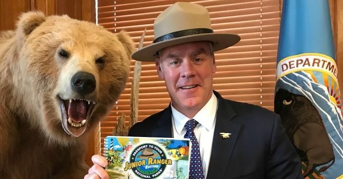 Interior Dept. Secretary Ryan Zinke posing for a photo last month with his Ranger hat on backwards. (Photo: NPS) 